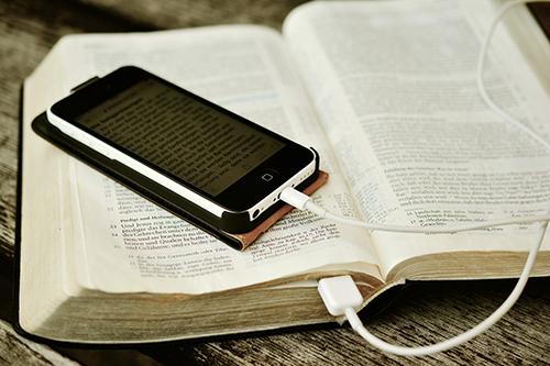 Image of Bible and Iphone for Contact Us Page